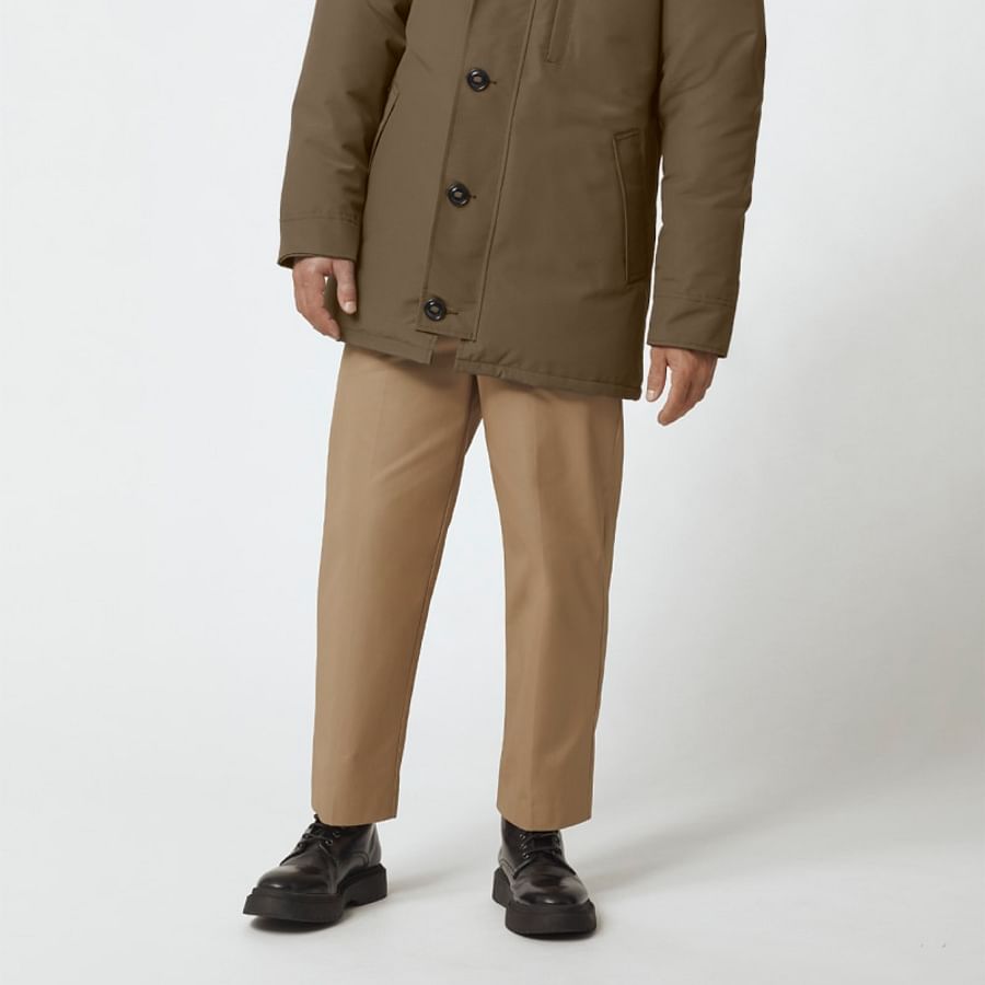 Historical photograph of men wearing early designs of parkas