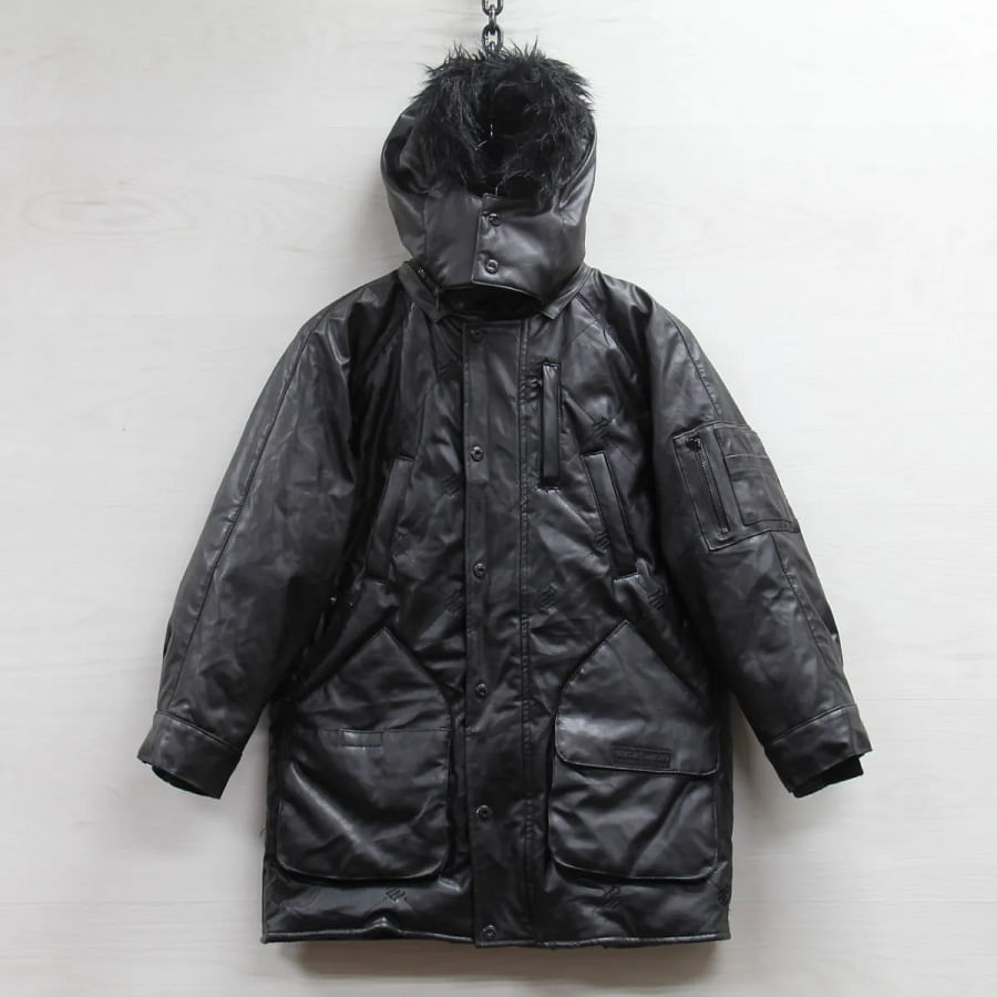 Vintage photo of people wearing black parkas